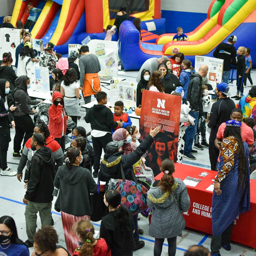 People attend a career fair.