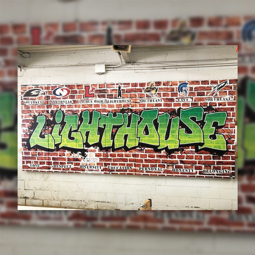 A brick graffiti style mural at Lighthouse.
