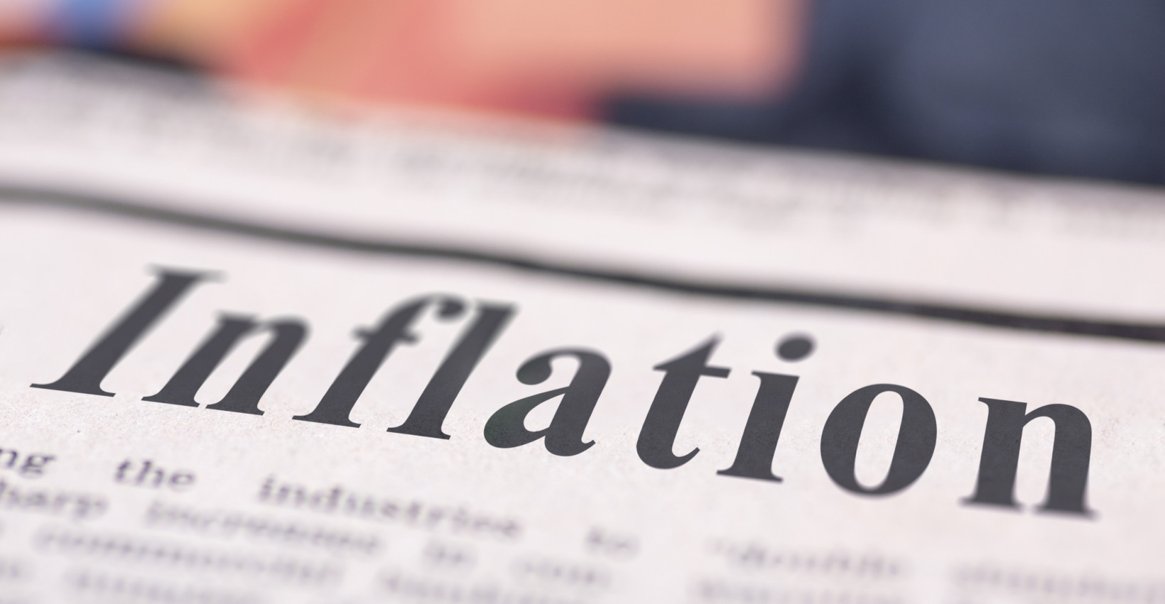 A newspaper with the headline "Inflation"