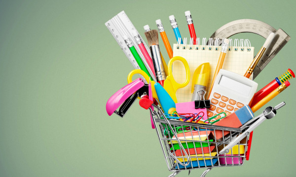 A shopping cart full of back to school items